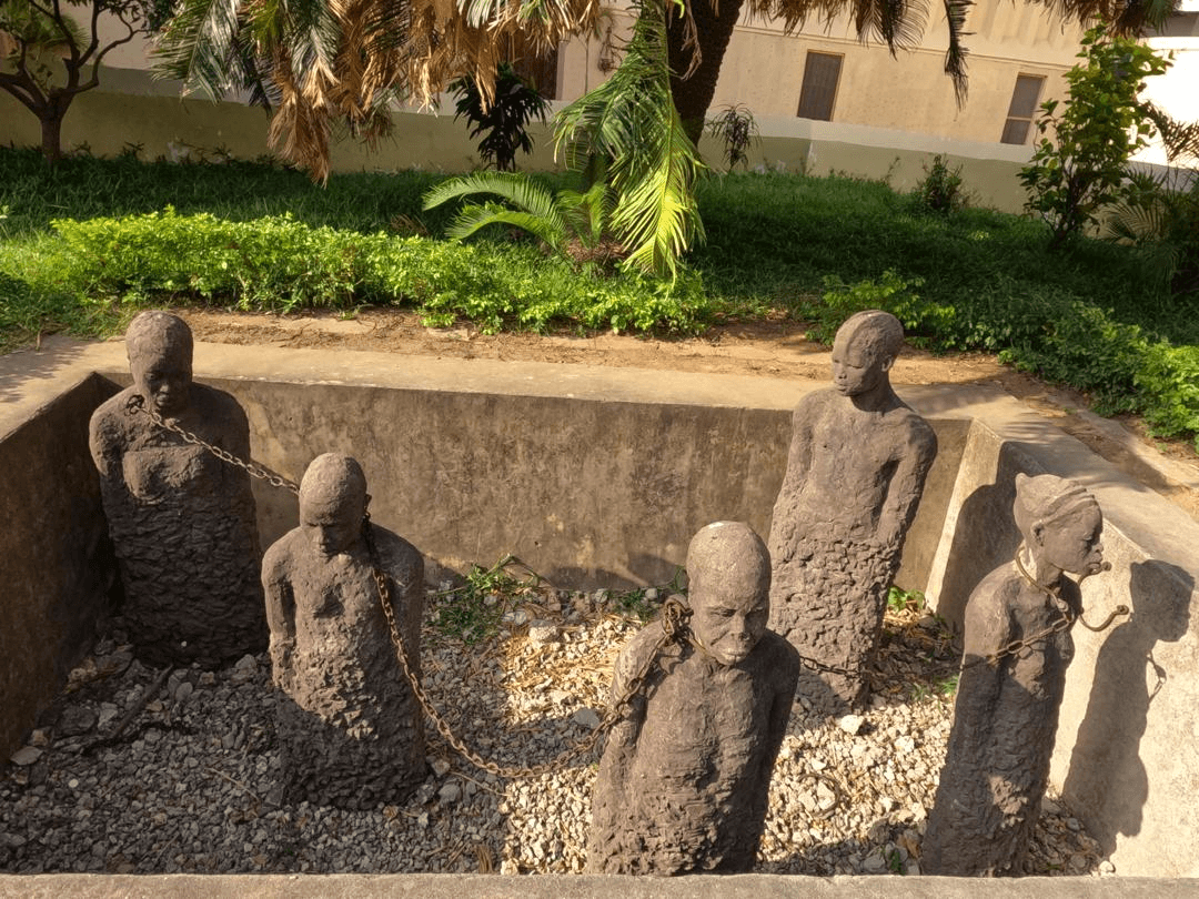 Stone Town memorial statues in a garden courtyard in Zanzibar